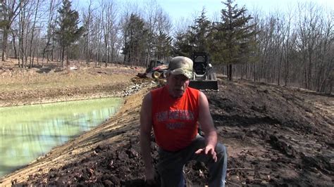 repairing ponds with skid steer|Skid steer for pond repair .